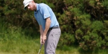 Hearn sits atop the field at the halfway point