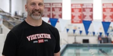 Thirteen championships and one big honor for Visitation swim coach