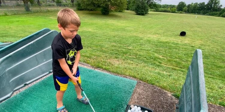 Youth learning life skills on First Tee golf course