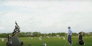 Hilarity ensues when Rory McIlroy battles a swing robot