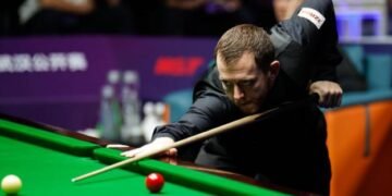 Champion of Champions: Mark Allen beats John Higgins to set up Judd Trump final