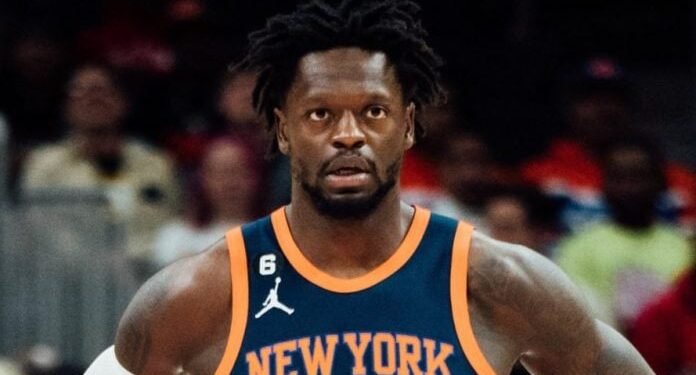 Mason Plumlee carried off court after collision with Julius Randle