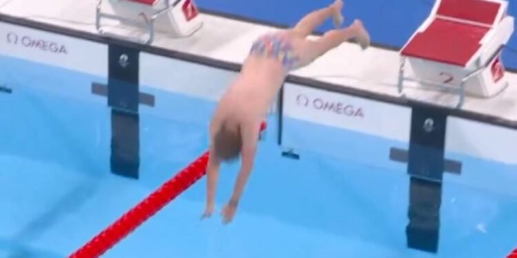 Unknown man wearing flowery speedos causes stir after diving into pool in bizarre sequence