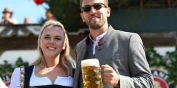 Harry Kane gets stuck into beer stein at Munich’s Oktoberfest as he’s joined by wife for festivities