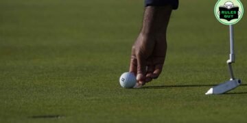 Are you allowed to touch your ball after picking up your mark?