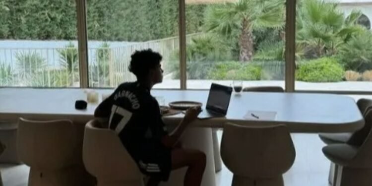 (Photo) Cristiano Ronaldo’s son spotted wearing named Man United shirt