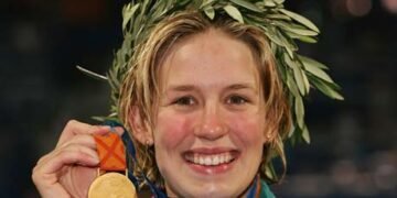 Olympic Champ Jodie Henry Making a Difference Outside of Pool