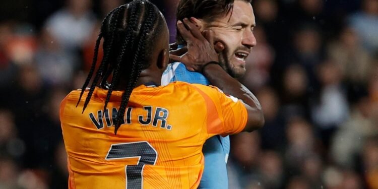 Vinicius Jr forced down tunnel by team-mate Rudiger in angry scenes after being sent off for pushing keeper in head